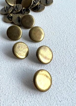 Ґудзик костюмний плоский з бронзовим відтінком на ніжці золотий 12мм метал
