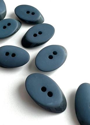 Пуговица  костюмная овальная толстенькая 2отв синяя 30/17мм пластик