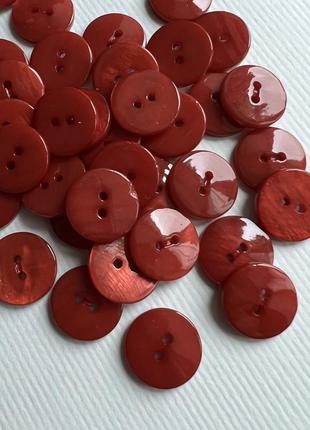 Ґудзик 500/589 сорочковий гладкий 2отвори червоний 15мм ракуш