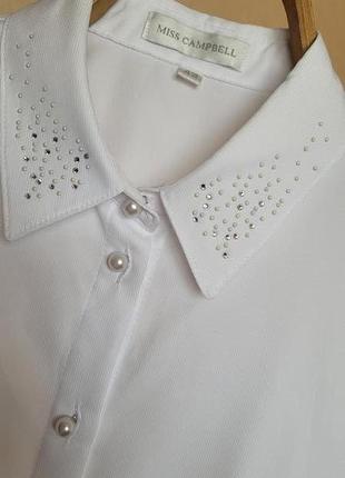 Нова біла блуза5 фото