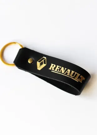 Брелок-петля "renault" новый,черный с позолотой.
