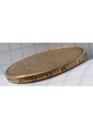 Монета 1 гривня 2006 р. аверс-аверс,орел з двох сторін.3 фото