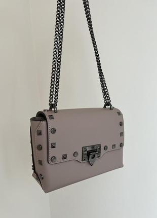 Шкіряна сумка бежевого кольору