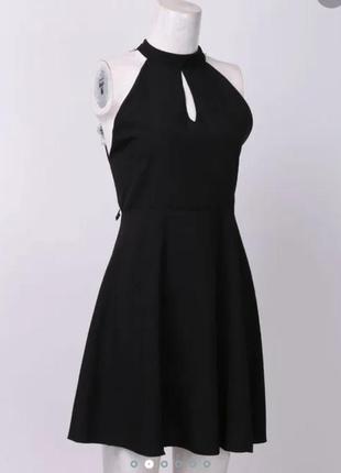 Коротка міні сукня з відкритою спинкою, по краям спинки-кружево