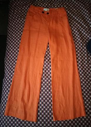 Оранжевые джинсы