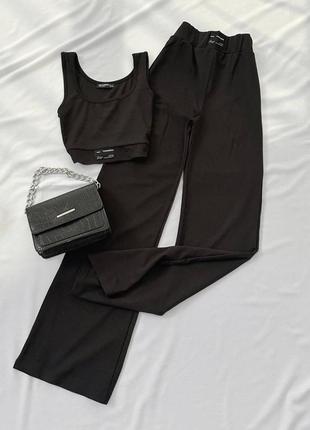 Базовый костюм в рубчик: топ укороченный и брюки свободного кроя сверхвысокой посадки, серый черный стильный качественный2 фото
