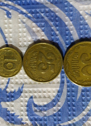 Монети  українські  10 25 50 копійок 1994 ооку3 фото