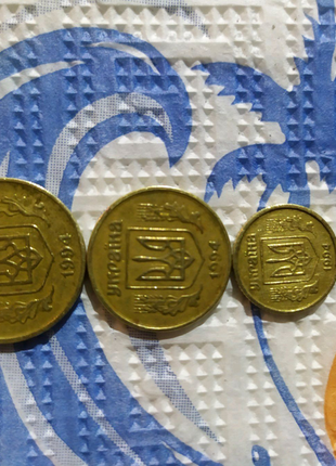Монети  українські  10 25 50 копійок 1994 ооку4 фото