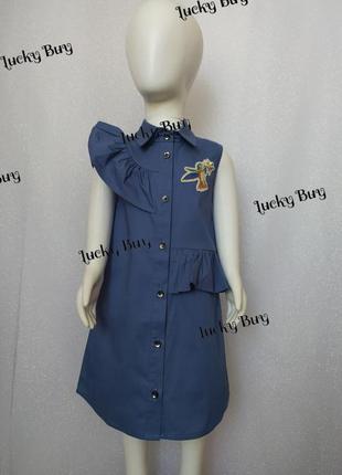 Детское платье с воланами и аппликацией.