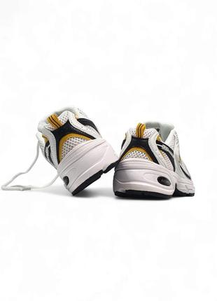 Женские кроссовки белые с желтым и черным new balance 530
white yellow black9 фото