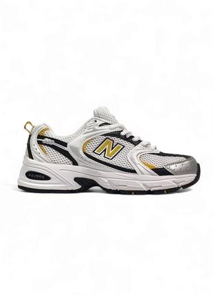 Женские кроссовки белые с желтым и черным new balance 530
white yellow black8 фото