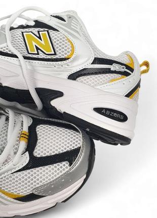 Женские кроссовки белые с желтым и черным new balance 530
white yellow black7 фото