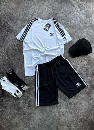 Комплект adidas футболка и шорты . футболка и шорты адидас5 фото