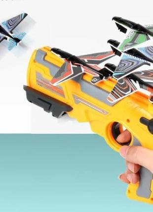 Дитячий іграшковий пістолет з літачками 4 шт air battle1 фото