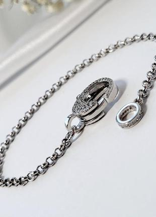 Серебряный женский браслет с большим замком с белыми камнями 17.5 см серебро 925 пробы родированное 2366р 4.8г5 фото