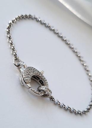Серебряный женский браслет с большим замком с белыми камнями 17.5 см серебро 925 пробы родированное 2366р 4.8г7 фото