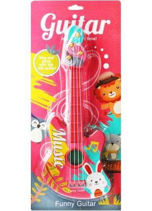 Музыкальная игрушка "гитара"2 фото