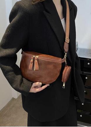 Маленька шкіряна жіноча сумка 2024, новий літній стиль, модна версія, сумка на пояс.2 фото