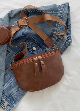 Маленька шкіряна жіноча сумка 2024, новий літній стиль, модна версія, сумка на пояс.7 фото