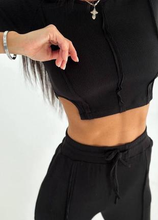 Костюм женский однотонный топ с швами на изнаношении брюки на высокой посадке качественный стильный черный2 фото