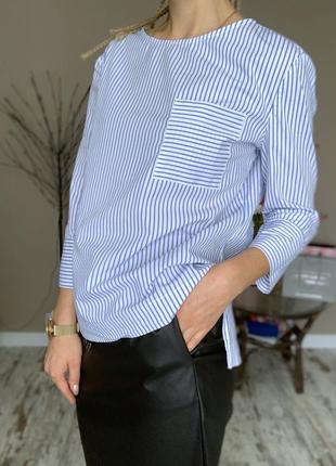 Блузка в смужку з кишенею