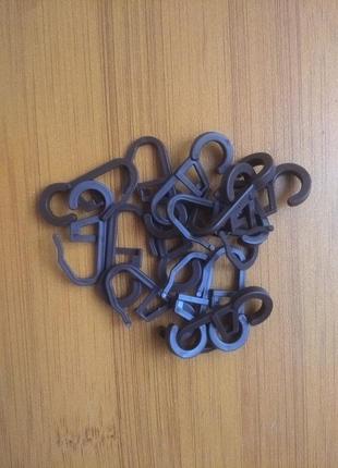 Крючки на кольца(темно коричневые) для металлопластиковых карнизов6 фото