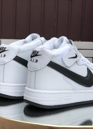 Жіночі зимові кросівки nike air force4 фото