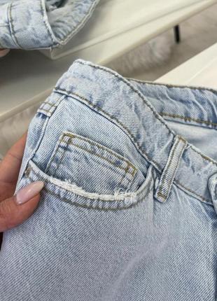 Рваные джинсы с высокой талией2 фото