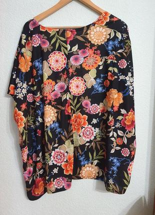 Трикотажная накидка пиджак в цветы4 фото