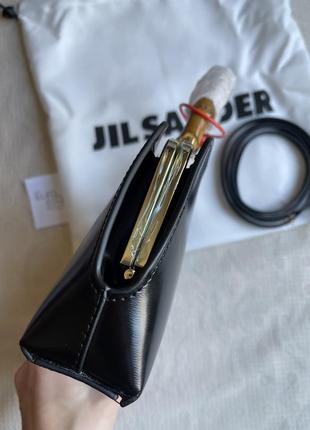 Чорна шкіряна сумка-гаманець із дерев'яною ручкою в стилі jil sander коричнева біла5 фото