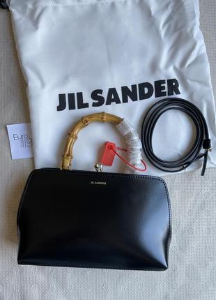 Чорна шкіряна сумка-гаманець із дерев'яною ручкою в стилі jil sander коричнева біла8 фото