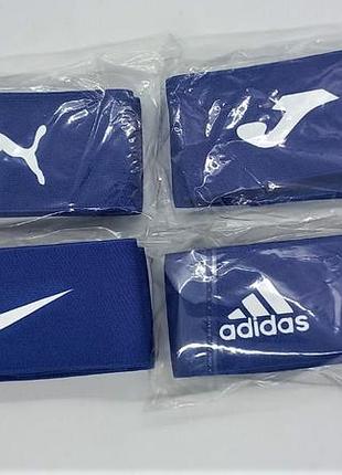 Тейпы фиксаторы хома для щитков резинки для защиты футбольная9 фото