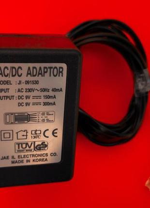 Адаптер блок питания для телефона ji-091530 9v 300ma