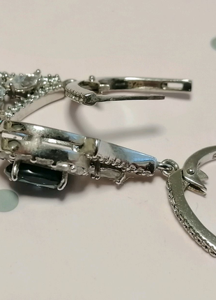 Срібний комплект (сережки та кільце) з топазом і цирконами5 фото