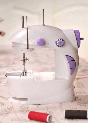 Швейна машинка портативна mini sewing machine fhsm 201 з адапте1 фото