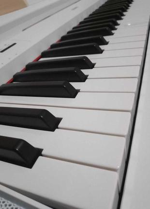 Сценічне піаніно yamaha np-12 white стан нового.1 фото