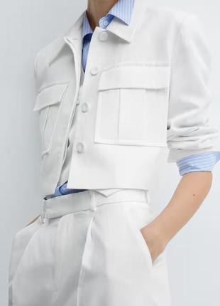 Укороченный пиджак с карманами5 фото