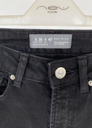 Актуальні джинси кльош з розрізами внизу на високій посадці скіні2 фото