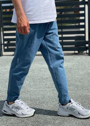 Топовые джинсы мом1 фото