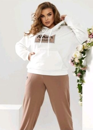 Костюм жіночий спортивний.напівбатал