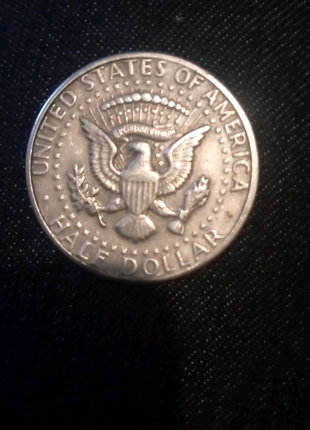 Монета один доллар сша