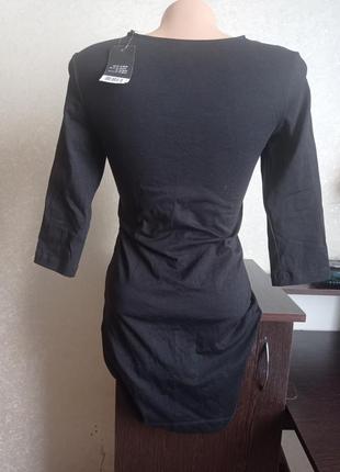 Удлиненная  фирменная черная футболка,туника.5 фото