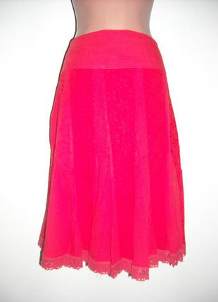 Спідниця червоного кольору з 100% бавовни,тканина з прошвой.