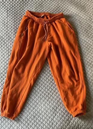 Оранжевые брюки puma оригинал (размер м)