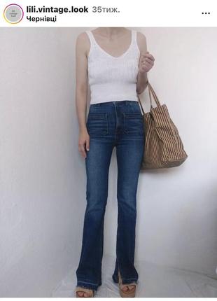 Джинси кльош  з кишенями з розрізами zara