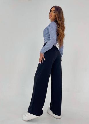 Женские весенние трендовые штаны с акцентными стрелками размеры 42-484 фото