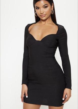 Черное эластичное мини платье по фигуре с длинным рукавом и глубоким вырезом/декольте