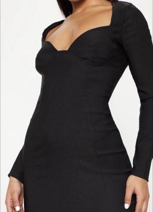 Чорне еластичне міні сукня по фігурі з довгим рукавом і глибоким вирізом/декольте2 фото