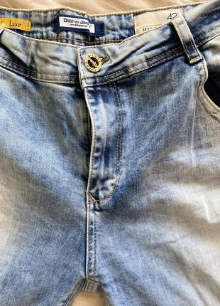 Крутые рваные джинсы3 фото