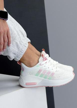 Белые текстильные кроссовки с розовыми вставками и с резиновым покрытием5 фото